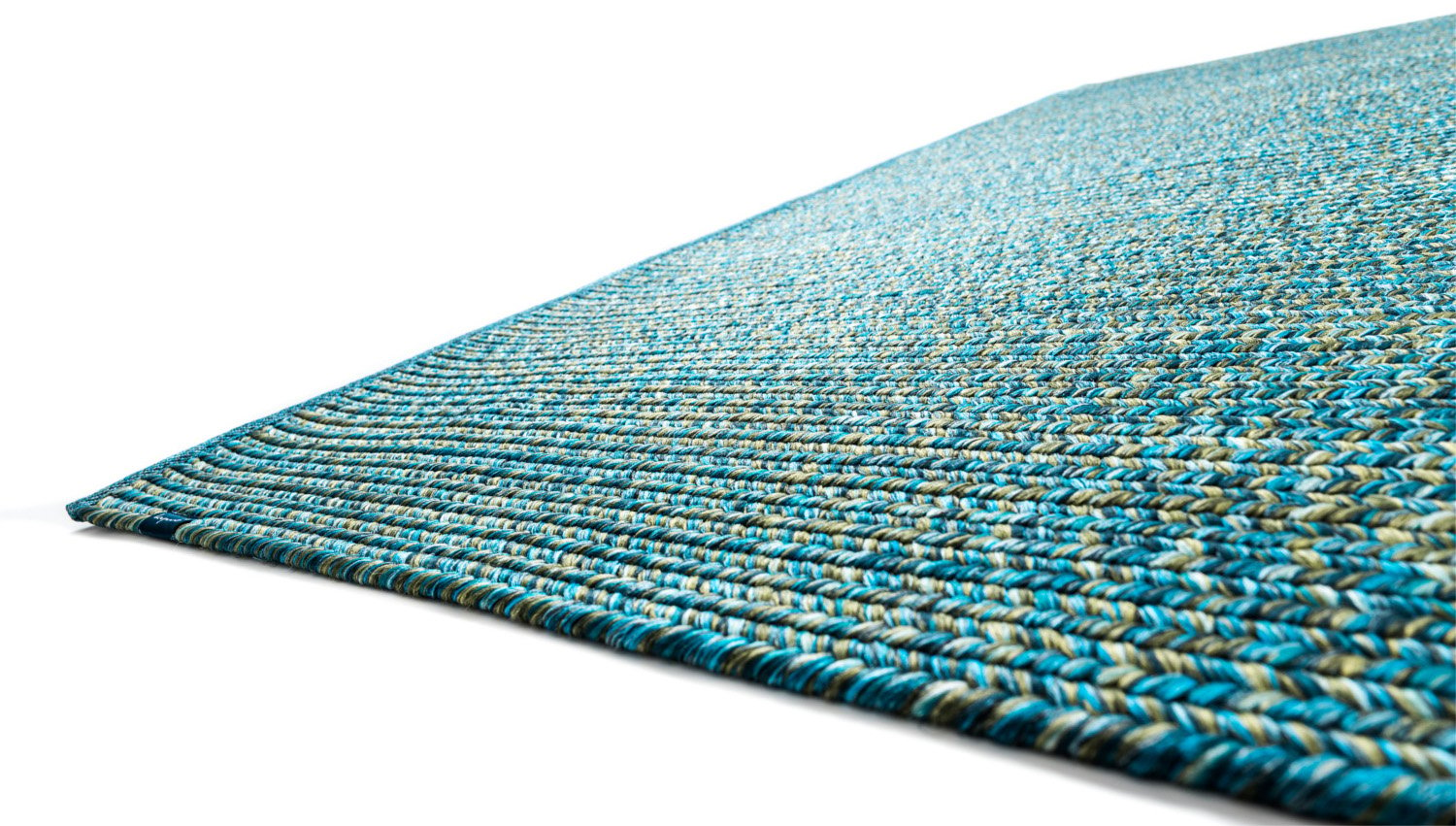 Colourful hand-braided outdoor carpet blue and green