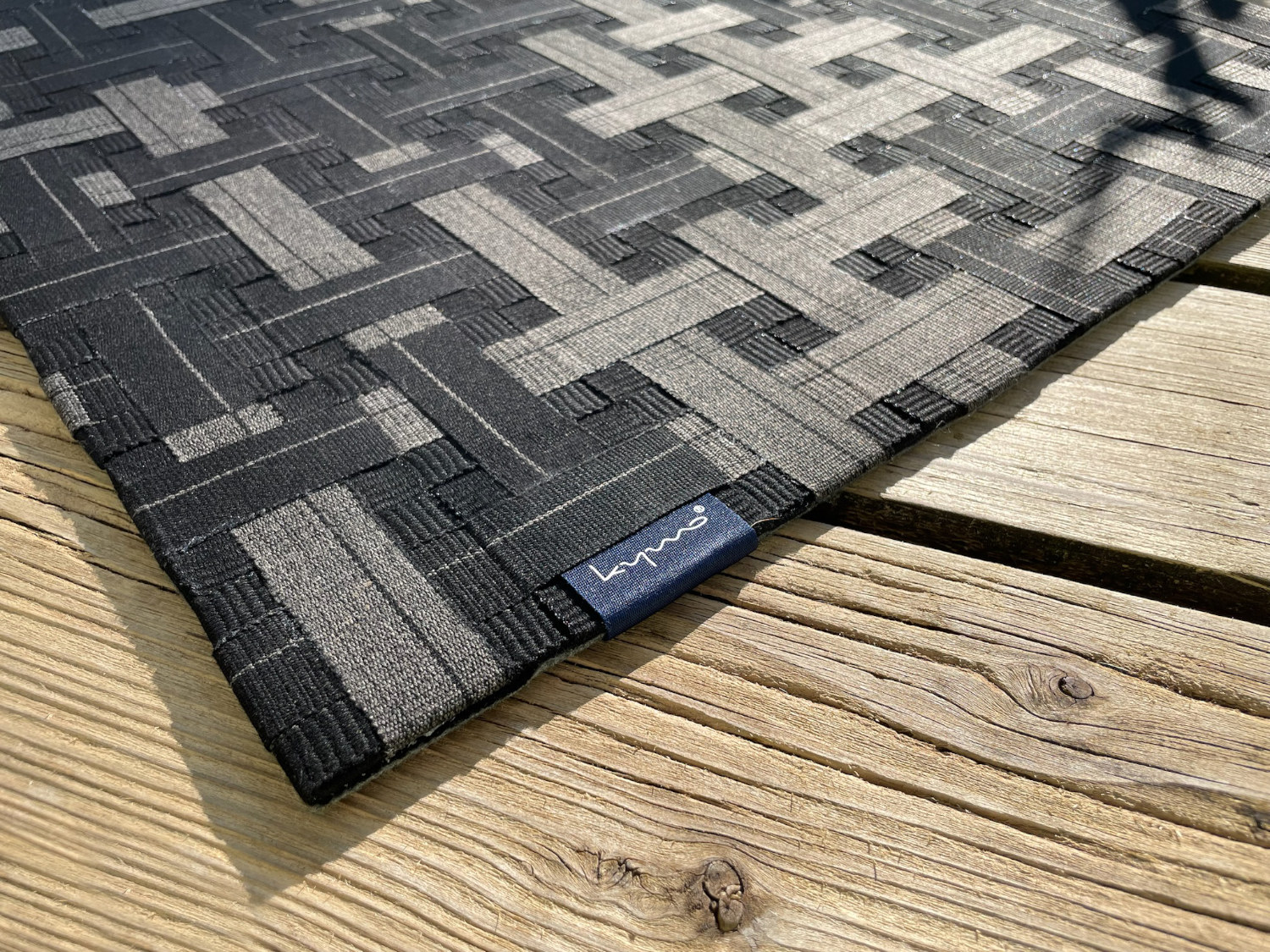 crossover black modern outdoor rug