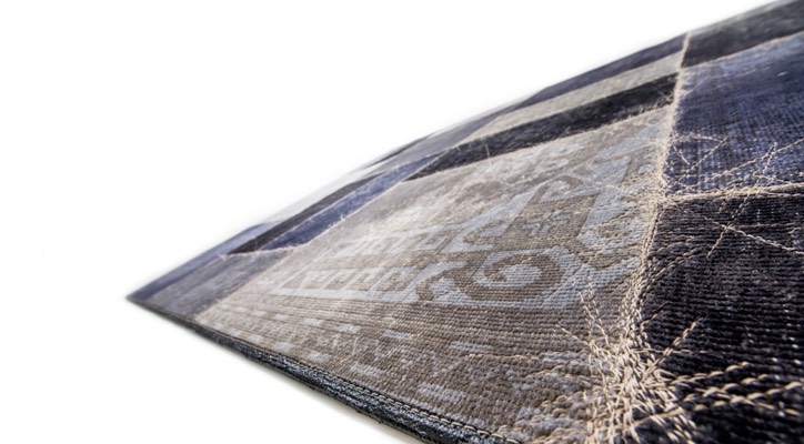 brown patchwork rug with modern stitching