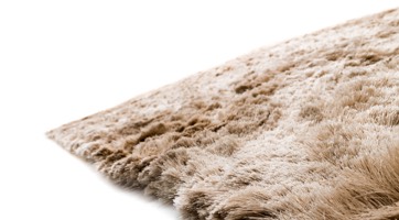 fluffy beige high-pile rug handmade from polyester