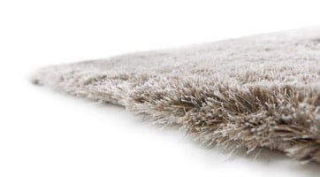 fluffy light grey rug made from polyester