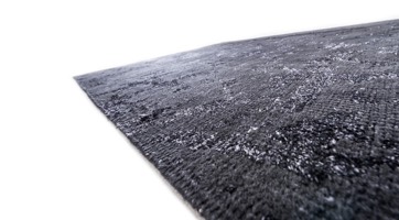 black rug with irregular pattern made from wool and viscose