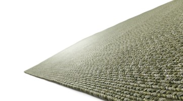 braided green rug suitable for outdoor use made from durable polypropylene