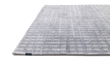 minimalist grey rug with bauhaus-inspired regular stripe design
