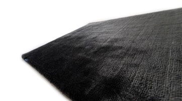 black high shine rug handwoven from viscose