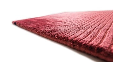 red high shine rug handwoven from viscose with sublte stripes