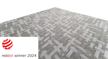 Light outdoor rug with woven flexible belt pattern.