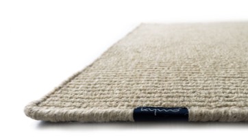 handknotted wool rug in natural plain colours