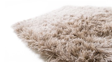 fluffy handmade wool rug with long grey pile